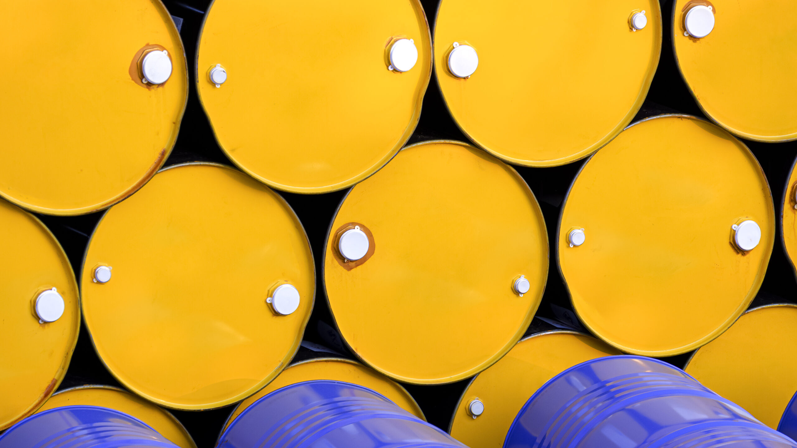 Oil barrels representing the oil and gas industry.